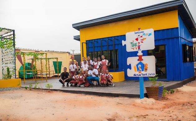 Celebrating the opening of this brightly coloured charging station made using recycled plastic tiles. Stanley Anigbogu projects bring vibrant solutions to underserved communities. Credit: LightEd