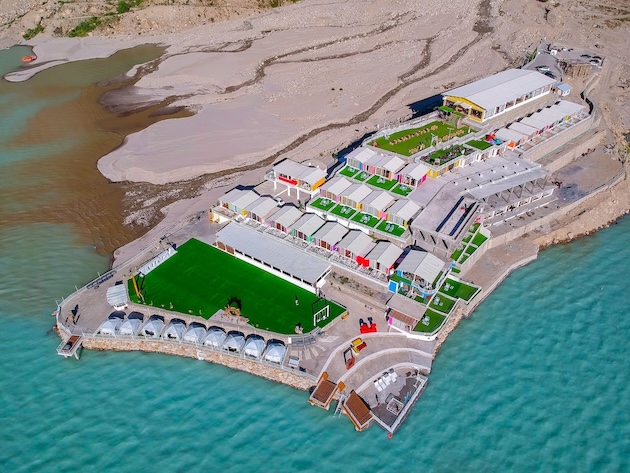 This illustration shows that the built-up area of Luxus Hotel in Hunza sits close to the 50-foot minimum setback from the lake mandated by the Environmental Protection Agency. It also appears that land has been reclaimed, and an embankment constructed along the lakeshore beside the hotel - A flash flood which engulfed the Luxus Hotel has resulted questions about the future mountain tourism in Pakistan’s Gilgit-Baltistan