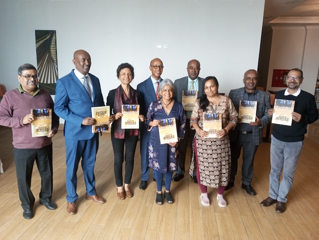 Sunita Narain (4th left), Director General of the Centre for Science and Environment, along with an invited guests and a team from Down To Earth, displays a copy of the State of Africa Environment during the official launch in Addis Ababa. Credit: Kizito Makoye/IPS