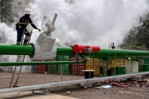 A worker operates a geothermal pipeline at the Laudat plant in Dominica, part of a clean energy project supported by the Global Environment Facility. The project illustrates the kind of system-wide transition GEF-9 aims to scale across small island developing states. Credit: Alison Kentish/IPS