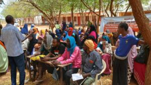 Residents of Garissa County, Kenya, attend a community sensitisation forum on identity and citizenship. Credit: Jackson Okata/IPS