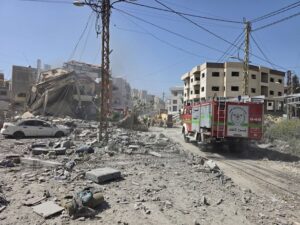 Rescue workers survey the damage in the town of Toul in Lebanon’s Nabatieh governorate in the south, following bombing by Israel in response to rocket attacks by militant group Hezbollah. Credit: Action Against Hunger