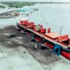 A bulk carrier takes on vast loads of coal at Mtwara Port in southern Tanzania – an image that underscores the stubborn grip of fossil fuels even as global negotiators push for a Net-Zero Framework to steer shipping toward cleaner energy. Credit: Kizito Makoye Shigela/IPS