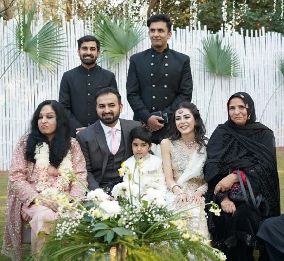 At the wedding of Imaan Mazari and Hadi Ali Chatha, Sachal (son of Mudassir Naru) sits between the two, on the far right; in black, Rahat Mehmood, Naru’s mother, sits. Credit: Rahat Mehmood