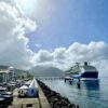 A cruise ship docks in Roseau, Dominica. The World Meteorological Organization says parts of the Caribbean are experiencing sea level rise above the global average as climate impacts intensify across the region. Credit: Alison Kentish/IPS