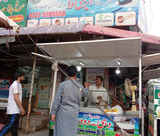 Rana Shahbaz’s milk stall was demolished by the city administration. Credit: Rana Shahbaz