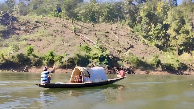 Farmer-turned-fishermen from the local indigenous community are fishing in the Dumboor lake in north-eastern India. At the Eighth Global Environment Facility Assembly, a project was approved involving three communities across India, including Dumboor Lake. Credit: Stella Paul/IPS
