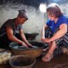Monika Stankiewicz, Executive Secretary of the Minamata Convention on Mercury, learns how to pan for gold in a free-mercury mine in Baguio, the Philippines, in 2024. Credit: Minamata Convention on Mercury