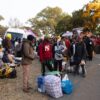 Malawian migrants wait to board a bus during repatriation efforts, 29 June 2026, at the Malawian Consulate in Woodmead, Johannesburg. Credit: Alaister Russell/IPS