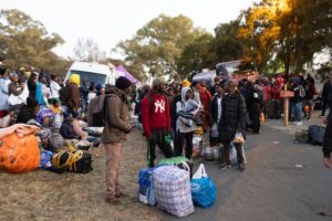 Malawian migrants wait to board a bus during repatriation efforts, 29 June 2026, at the Malawian Consulate in Woodmead, Johannesburg. Credit: Alaister Russell/IPS