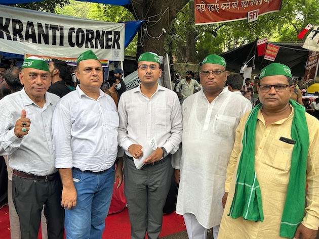 Ashutosh Agarwal (centre), national vice-president of the Bharatiya Kisan Union, India's Youth Wing, stands with colleagues from Meerut in solidarity with the student-led movement. Credit: Aishwarya Bajpai/IPS