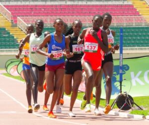 Josephine Sembeyo (in blue) competes during Kenya's World Athletics Under-20 trials in May, where she qualified for the World Athletics Under-20 Championships in Oregon. Credit: Robert Kibet/IPS