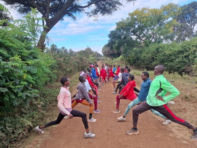 Girls from Magnolia Athletics Camp during a daily road training session in Oloitokitok, Kenya. Credit: Robert Kibet/IPS