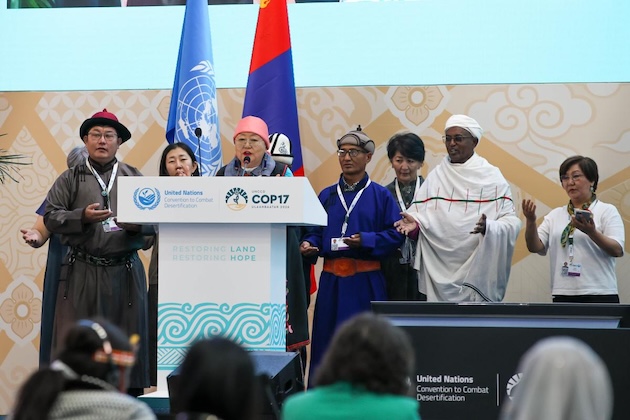 Participants in traditional dress take part in a cultural presentation during the 17th session of the UN Convention to Combat Desertification (UNCCD COP17) in Ulaanbaatar, Mongolia. Credit: Anastasia Rodopoulou/ENB-IISD