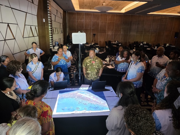 Leotasi Kautu, School Principal from Tuvalu, presents the 3D inundation model of Funafuti, developed by SPC and the Government of Tuvalu to map flood risk and guide climate adaptation. Credit: SPC