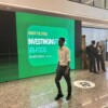 A delegate passing through a billboard at the Africa Food Systems Forum at Kigali Convention Centre in Rwanda's capital. Credit Farai Shawn Matiashe.jpeg