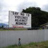 A public streetside sign advocates against gender-based violence in the Highlands of Papua New Guinea. Credit: Catherine Wilson/IPS