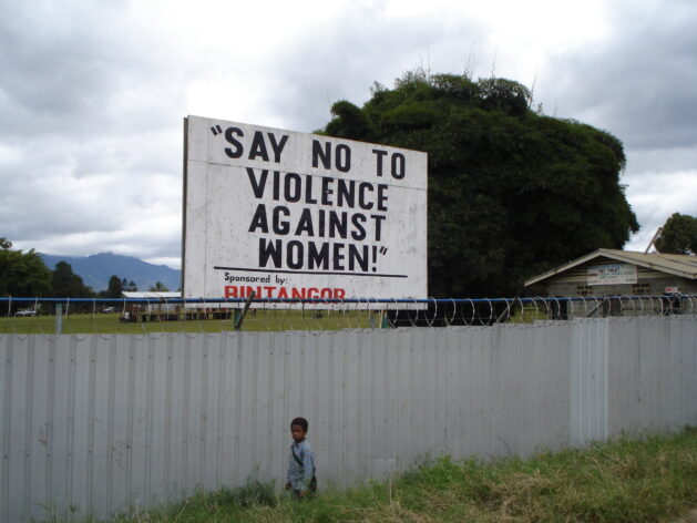 A public streetside sign advocates against gender-based violence in the Highlands of Papua New Guinea. Credit: Catherine Wilson/IPS