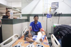 Subash Tamang, rescued from the Bhotekoshi flood, is under treatment at Kathmandu Trauma Center; three of his family members are still missing. Credit: Sunita Neupane/IPS