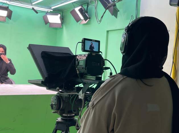 Afghan women journalists face growing barriers to reporting as a smartphone ban in government offices restricts access to official sources.