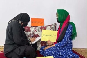 Afghan women's protests continue online despite Taliban restrictions, as activists risk their safety to defend education, freedom and women's rights