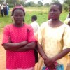 Alice Kakwindi and Grace Chimhosva waiting at Beitbridge. Credit:  Stanley Kwenda/IPS