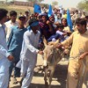 Mai Jori (with blue head covering) leading a rally on a donkey. Credit: Election Media Cell of Awami Party Pakistan