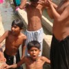 To beat the heat, children dip in the water courses in Hyderabad, Sindh province in Pakistan. Credit: Zofeen Ebrahim/IPS