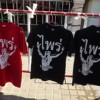 Shirts on sale at the protest site in Bangkok say 'prai', which refers to the low and uncouth 'commoners'. Credit: Johanna Son/IPS