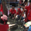 Anti-government protesters sharpen bamboo poles into spears as they prepare for a possible army clampdown. Credit: Marwaan Macan-Markar/IPS
