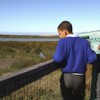 Grade 7 pupils at the Rondevlei Nature Reserve: children can be a key part in community river health monitoring. Credit:  Kristin Palitza/IPS