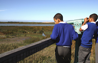 Grade 7 pupils at the Rondevlei Nature Reserve: children can be a key part in community river health monitoring. Credit: Kristin Palitza/IPS Grade 7 pupils at the Rondevlei Nature Reserve: children can be a key part in community river health monitoring. Credit: Kristin Palitza/IPS
