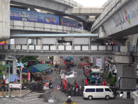 Anti-government protesters camped out near Bangkok's shopping heartland, where they have created 'gates' of tyres and bamboo poles. Credit: Johanna Son/IPS Anti-government protesters camped out near Bangkok's shopping heartland, where they have created 'gates' of tyres and bamboo poles. Credit: Johanna Son/IPS