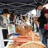 Economist Mari Cat selling farm produce at a Slow Food Market in Brasov. Credit: Claudia Ciobanu/IPS