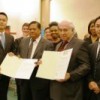 SGI representatives submit anti-nukes signatures at the United Nations. Credit: Courtesy of SGI