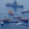 A mobile offshore drilling unit holds position directly over the damaged well as crews work to plug the leak using a technique known as "top kill". Credit: U.S. Coast Guard