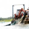 Government squads demolish illegal stake net prawn enclosures on the Chilka Lagoon in eastern India. Credit: Manipadma Jena/IPS