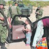 A child who has seen his dying mother remains at the scene, to the indifference of soldiers. Credit: Courtesy of El Diario, Ciudad Juárez (printed by permission).