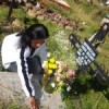Jacqueline Condori visits the grave of her mother Bernardina Yucra.  Credit: Milagros Salazar/IPS