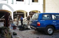 Coalition soldiers evacuate U.N. staff from their headquarters in Baghdad, formerly the Canal Hotel, after the Aug. 19, 2003 truck bombing. Credit: UN Photo/Timothy Sopp Coalition soldiers evacuate U.N. staff from their headquarters in Baghdad, formerly the Canal Hotel, after the Aug. 19, 2003 truck bombing. Credit: UN Photo/Timothy Sopp