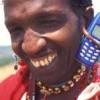 A pastoralist Maasai shows off his mobile phone in Kenya. Credit: Neil Thomas/IRIN