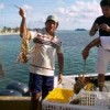 Fishers in Quintana Roo with their lobster catch.  Credit: Courtesy of Equator Initiative