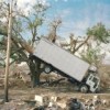 A truck left in the wake of Hurricane Katrina in New Orleans.  Credit: Susannah Sayler/The Canary Project, Cleveland Museum of Natural History