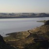 Namibia's Hardap Dam reservoir: coordinated distribution of electricity could reduce reliance on costly, polluting peak generation. Credit:  Thomas MacMillan/Wikicommons