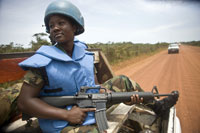 Private Linda Mensah patrols the city of Buchanan with the Ghanaian Battalion of the United Nations Mission in Liberia. Credit:   