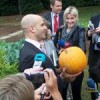 Assistant White House chef Sam Kass hefts a home-grown pumpkin in the kitchen garden. Credit: Matthew O. Berger/IPS