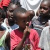 Children in camp for earthquake survivors want food and schools. They're threatened with eviction. Credit: Judith Scherr/IPS