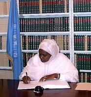 Samia Ahmed Mohamed, former Sudanese minister for social welfare, signs optional protocol of the convention on the rights of the child in 2002. Credit:  UN Photo