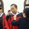 Secretary-General Ban Ki-moon receives an honorary degree from Nanjing University during his recent trip to China. Credit: UN Photo/Mark Garten