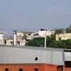 Biomedical waste incinerator in the midst of Sukhdev Vihar in New Delhi. Credit: Ranjit Devraj /IPS